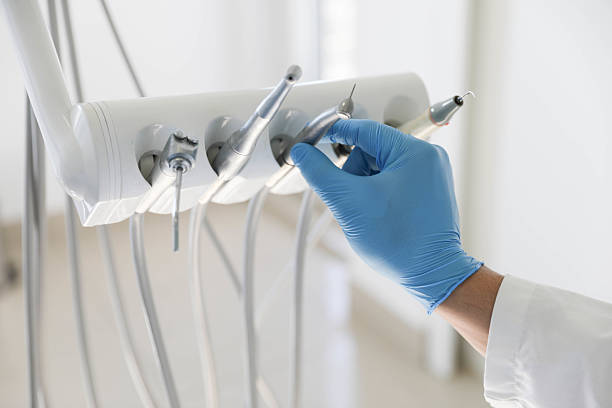 Professional Tooth Extraction technician working in Montgomery County County, MS